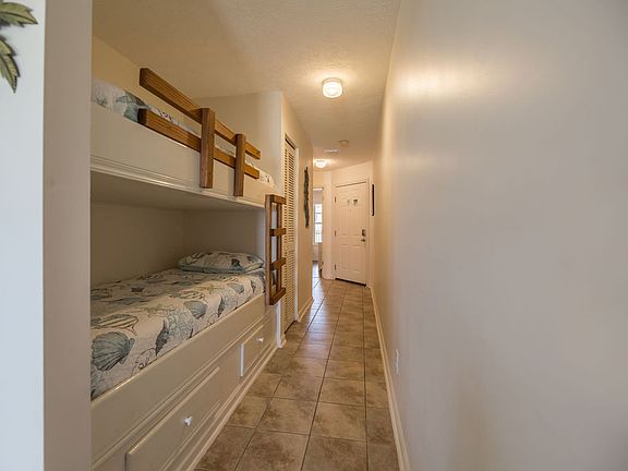 Bunk beds in hall of condo.