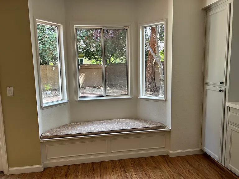 Window seat in the kitchen area.