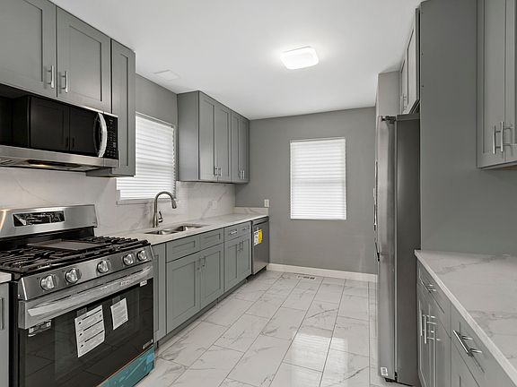 5th image of 102 E 140th Ct