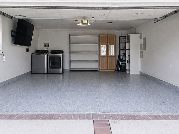 Garage: Epoxy flooring and Central Air/Heating