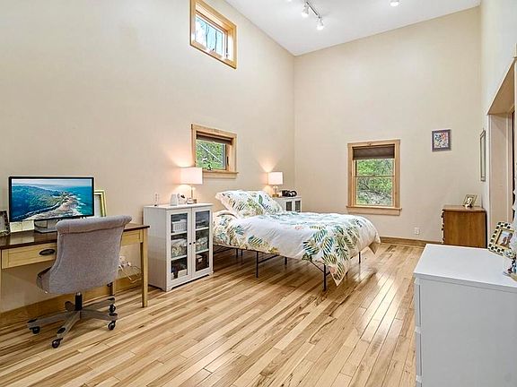 Bedroom with large spacious and deep closet. Mini split for heating and cooling. Beautiful hardwood floors