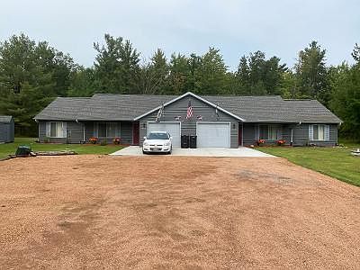 Front of duplex, owners live on left side. Right side is the rental. One stall garage & parking on driveway in front of garage. Storage closet in garage. Ground level entry at front door and garage into house. No basement, no steps.