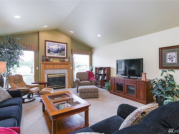 Living Room with Vaulted Ceilings & Gas Fireplace