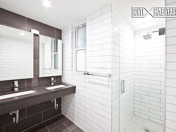 5th image of 66 E 7th St APT 20