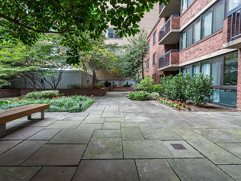 private tree lined patio in common area