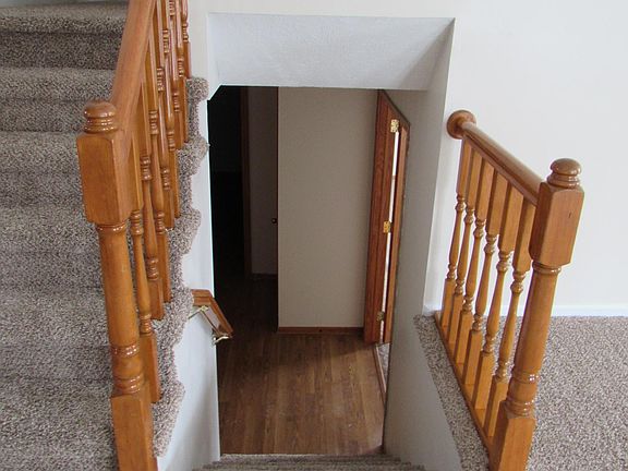 Down stairs to garage entry/ laundry / family room / 1/2 bath