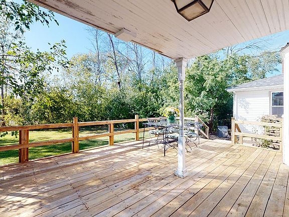 Back secluded porch overlooking two acres