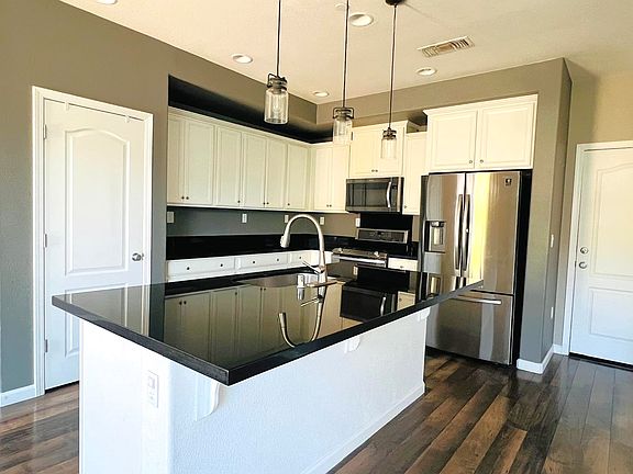 Kitchen area with pantry