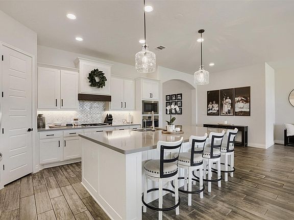 4th image of 616 Breezygrass Way