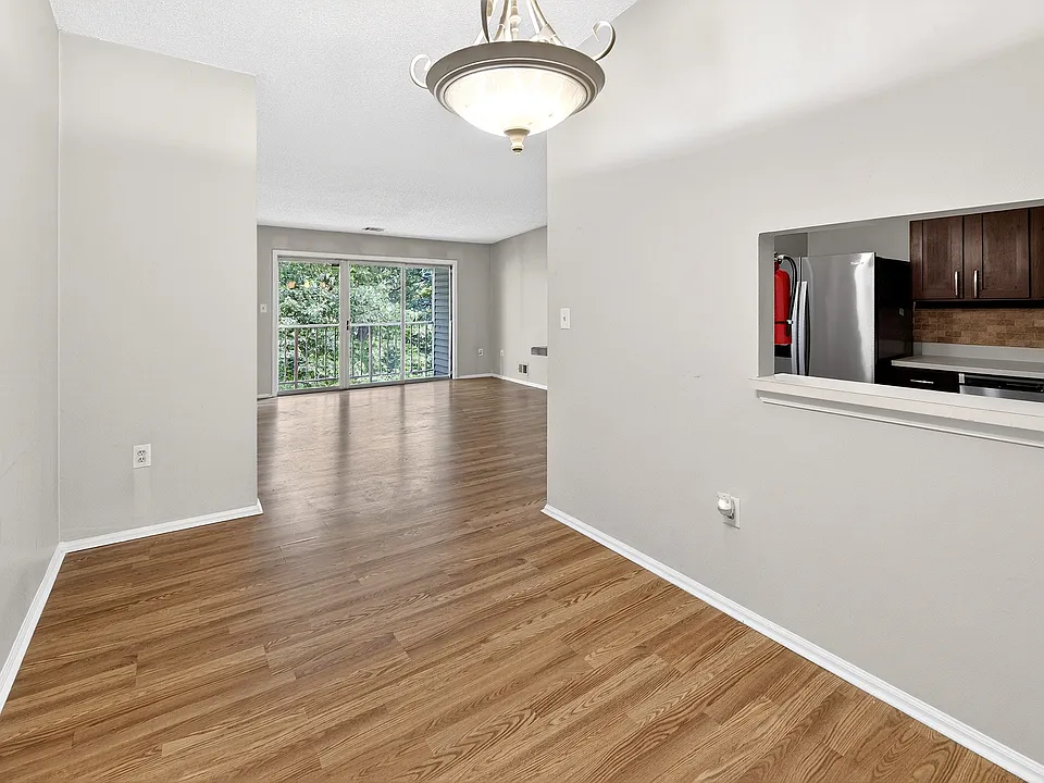 View from formal dining rm to large living rm