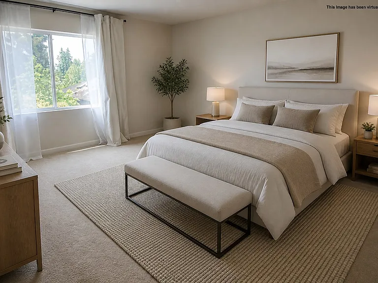Primary Bedroom with walk in closet, virtually staged.