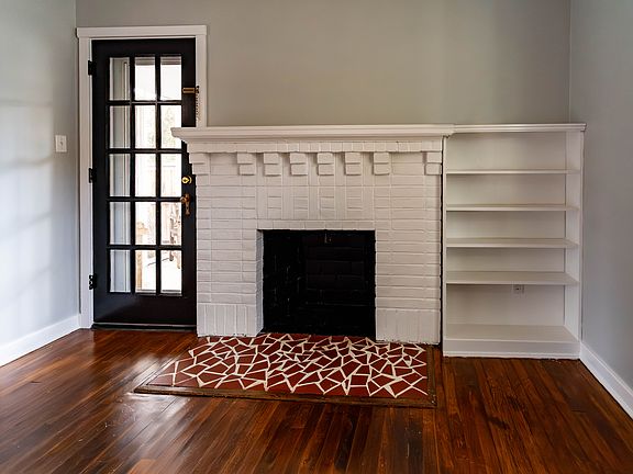 1st floor. Living room, with interior door to screened in porch.