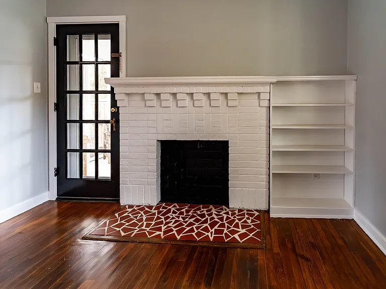 1st floor. Living room, with interior door to screened in porch.