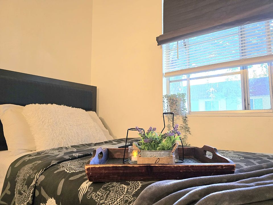 Comfy Bed with view of Green and Trees