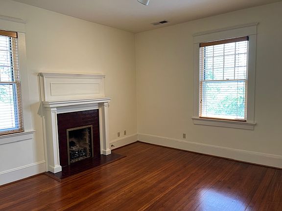 Living Room with large windows; great light with east and north orientation