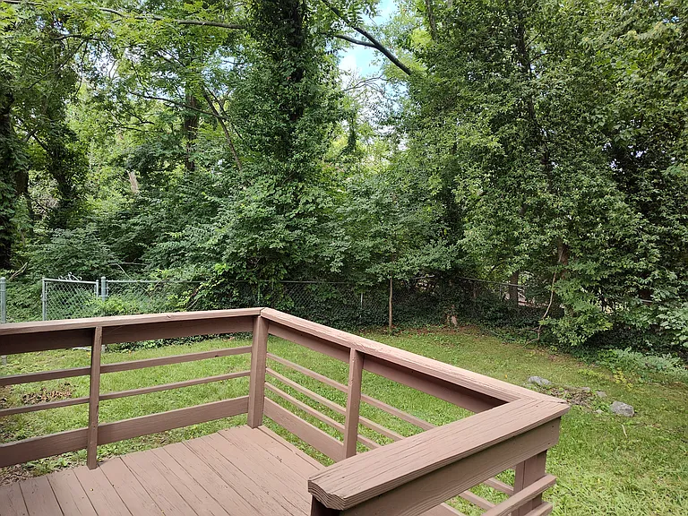 HUGE backyard with a deck