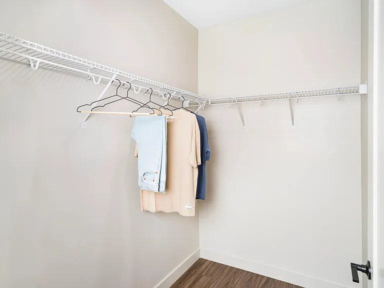 Each primary bedroom includes a spacious closet with built-in shelving to help keep everything organized.