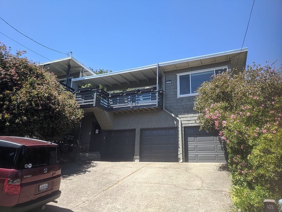 3 unit building, each has garage space & storage, far right is #418