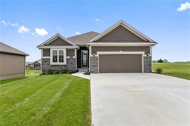 The Coventry by Ernst Brothers Home Construction. This PHOTO is of another Coventry Villa. 1902 NE