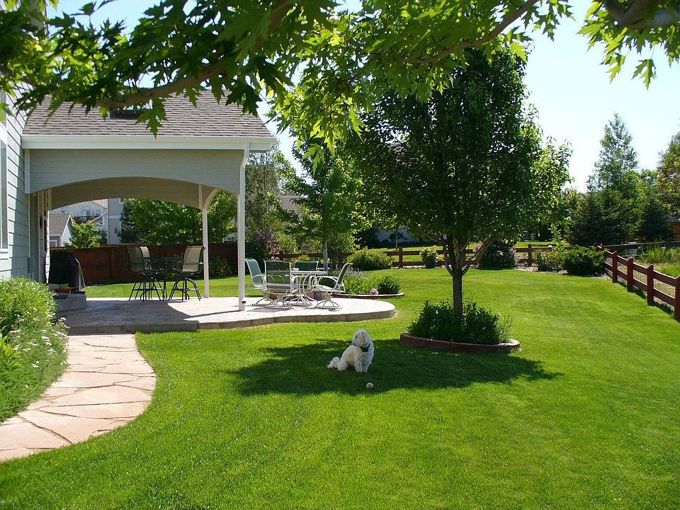 Covered Stamped Concrete Patio w/ Skylights, Speakers, Fire Pit and Grill Gas