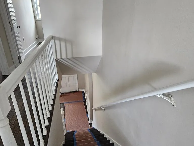 Top of stairs looking into front door