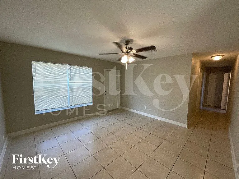 5980 NW 24th Ct — Photo 3