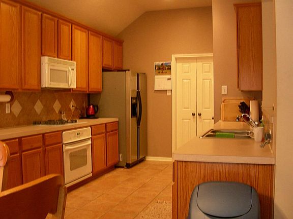 Large open kitchen with lots of counter and storage space.