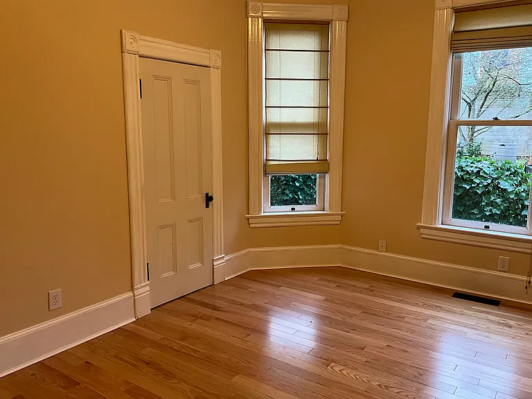Main floor bedroom with shades open