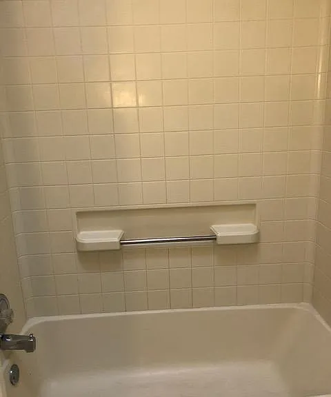 Full bathroom with bathtub
