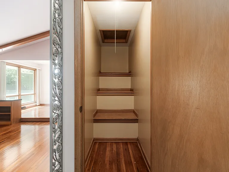 Storage and coat closet on the main level. Access to the attic for additional storage