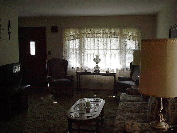 Living room- hardwood under thick carpets!