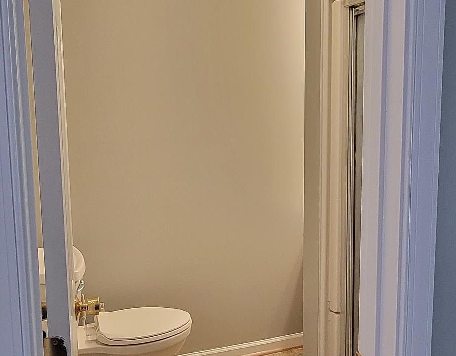 Full bathroom with stand up shower, vanity, sink, and mirror