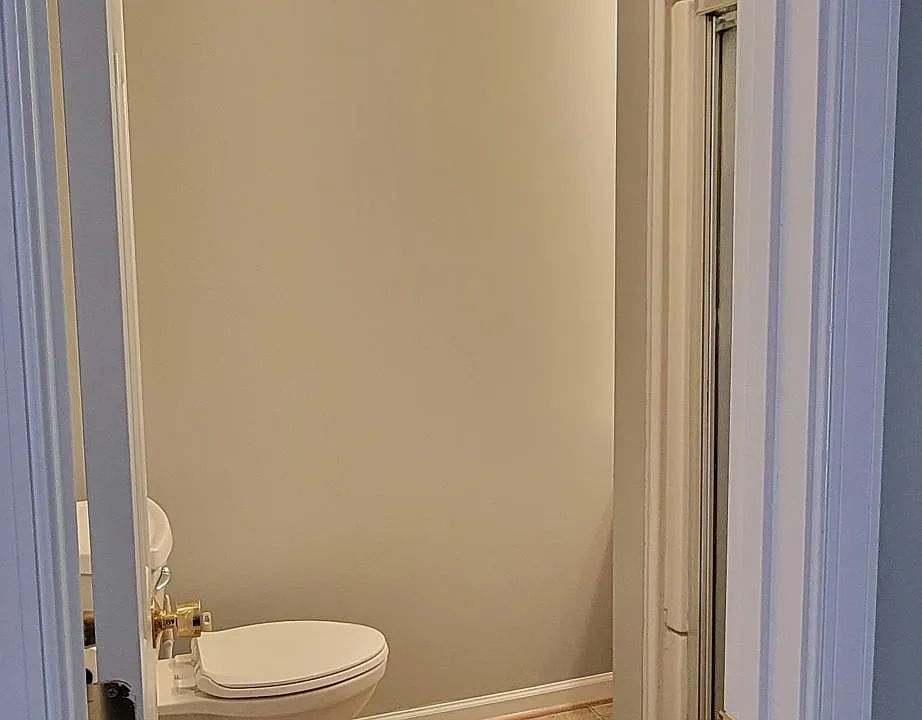 Full bathroom with stand up shower, vanity, sink, and mirror