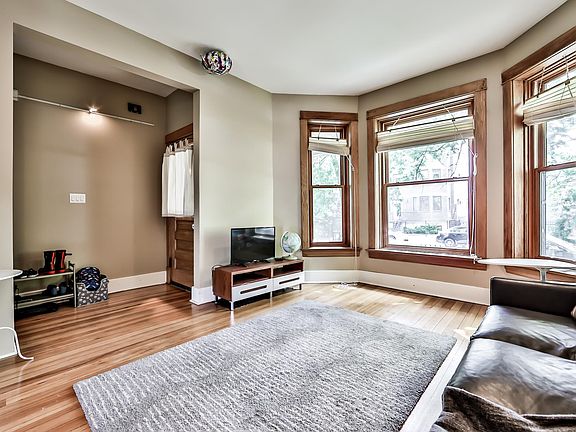 View of the living room looking toward the entry door