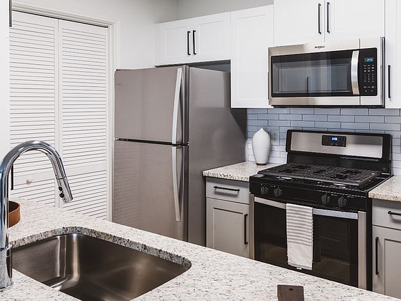 Sleek stainless steel appliances with updated features