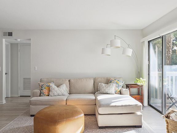 Spacious living room with an abundance of natural light.