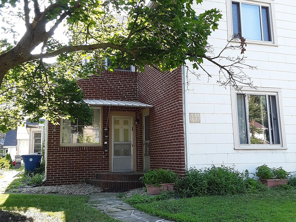 Unit on left side of duplex. (brick front)