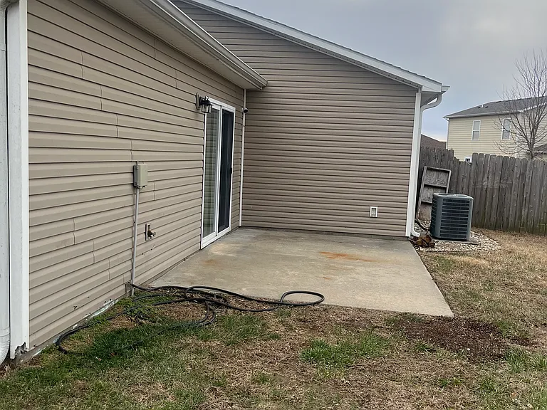 Spacious concrete back patio for grilling, entertaining and enjoying the outdoors!