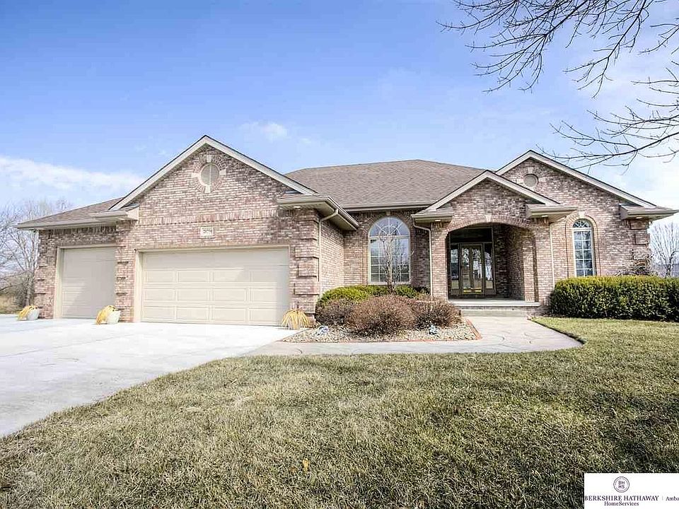All brick ranch on 4.82 acres.