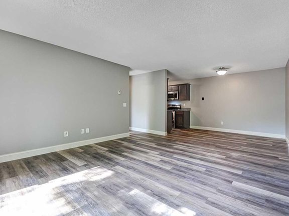 open floor plan to dining and kitchen