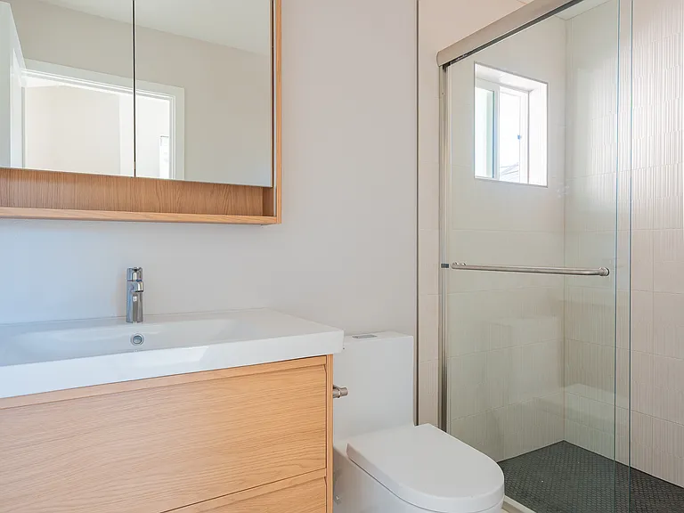 Upstrairs bathroom with full size shower