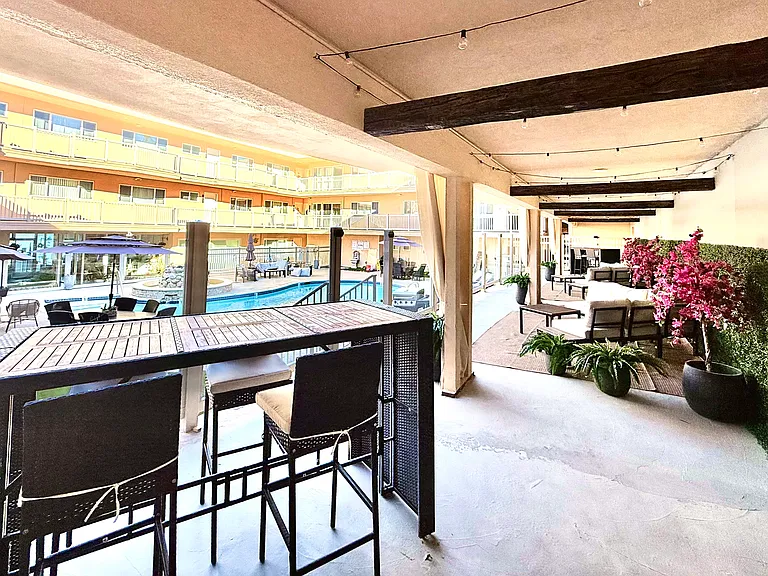 Beautiful outdoor but covered Water front co-work area with ocean & pool view. Work from home to the sounds of the calming water fountain