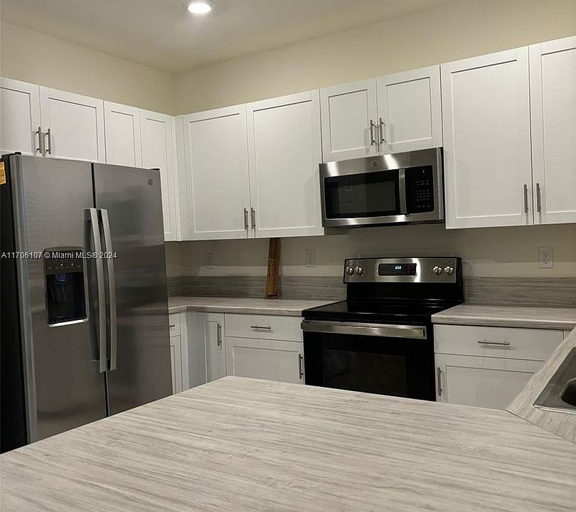 1st image of 10819 W 33rd Ln #10819