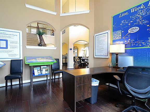 This was the Sales Office for the Model but is actually the Study. It is sure to impress with a two-
