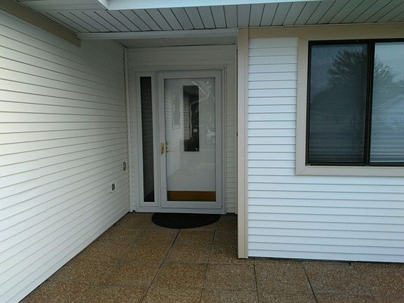 Sheltered front door entry