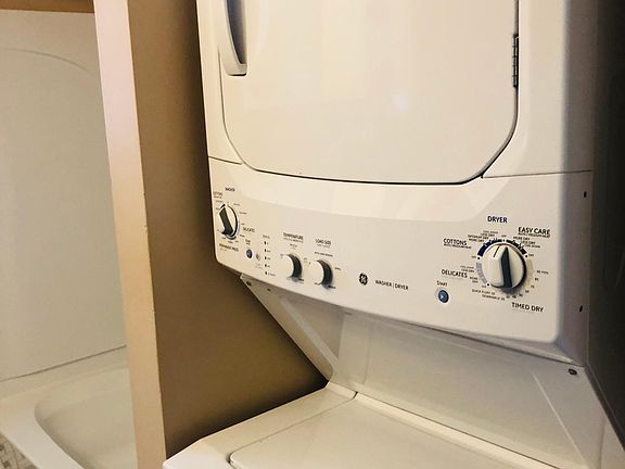 Tile bath with washer dryer