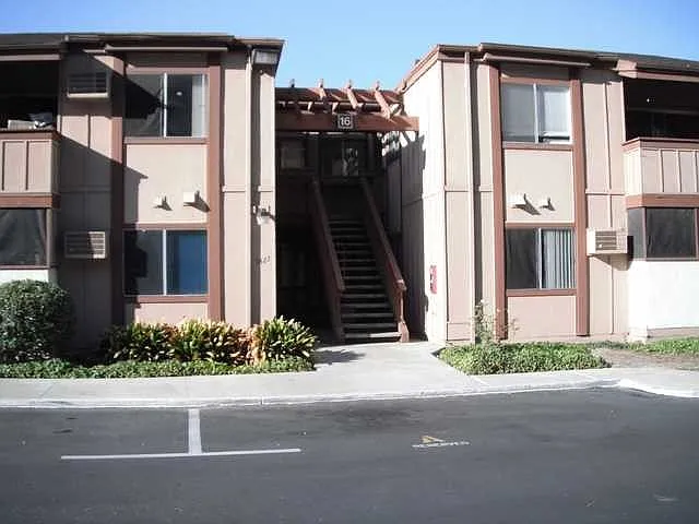 Second floor unit with parallel parking space in front. 2 parking spaces included.
