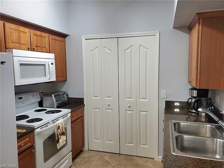 12930 Positano Cir #107 — Photo 5