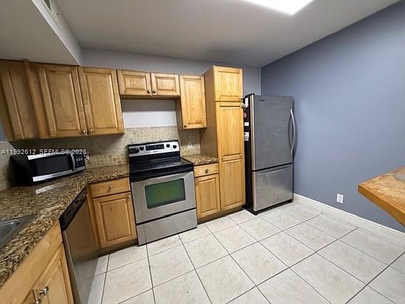 2nd image of 8901 Wiles Rd APT 103