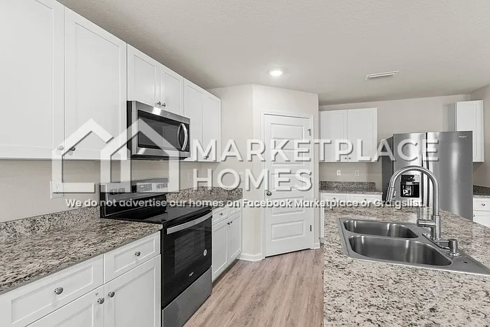 7504 Delancey St — Photo 12